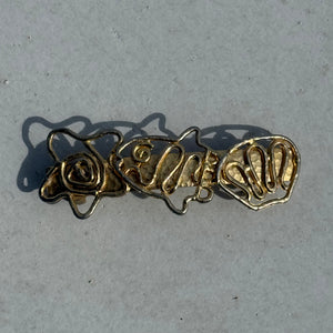 vintage fish swirl barrette