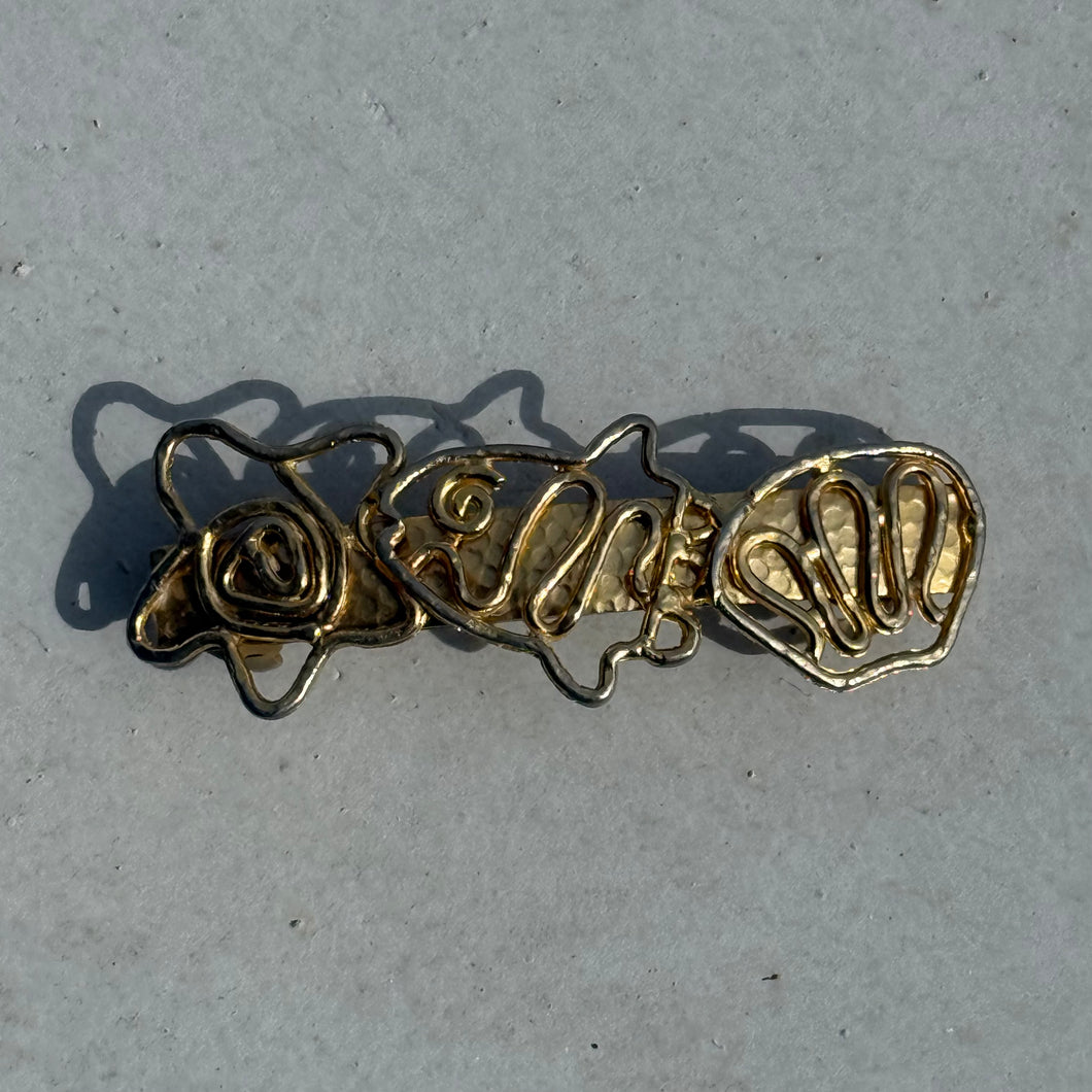 vintage fish swirl barrette